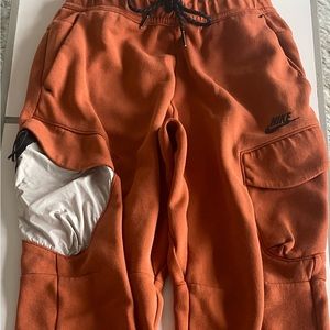 Nike Sportswear Tech Fleece. Men’s joggers. Orange/Black Size S.
